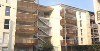 Photo de l'immeuble de logements réalisé. 